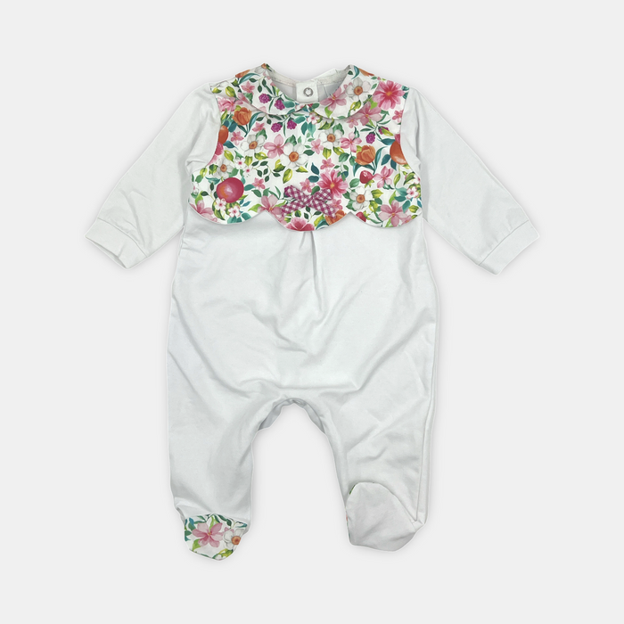 Tutina neonata in cotone con motivo floreale e fiocchetti ricamati