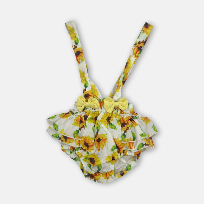 Salopette con gonna in cotone con fantasia floreale